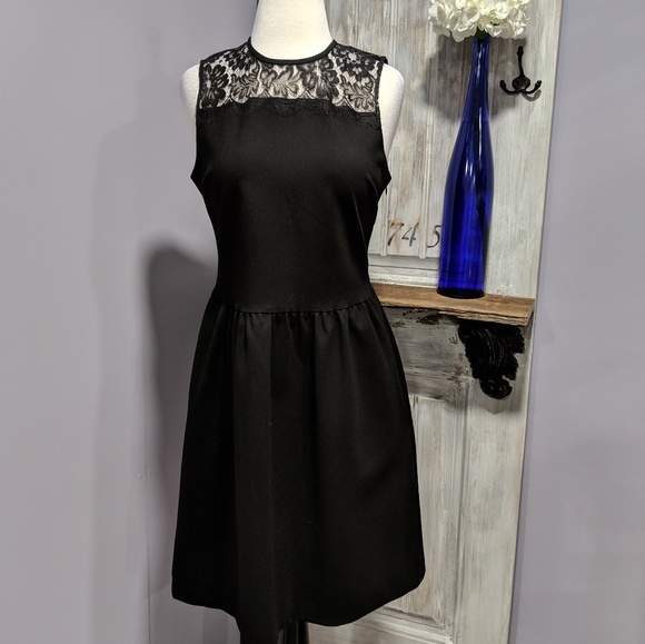 elorie Dresses & Skirts - Elorie black sleeveless dress with lace on bodice
